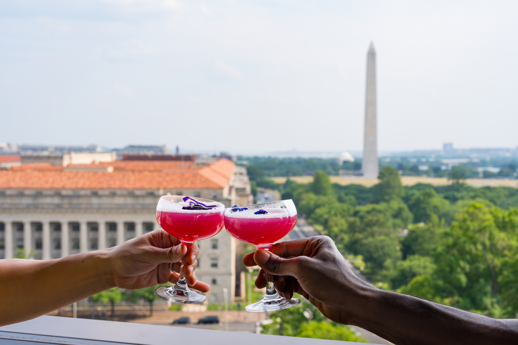 Drinks on top of the Vue with the Washington Monument in the background 